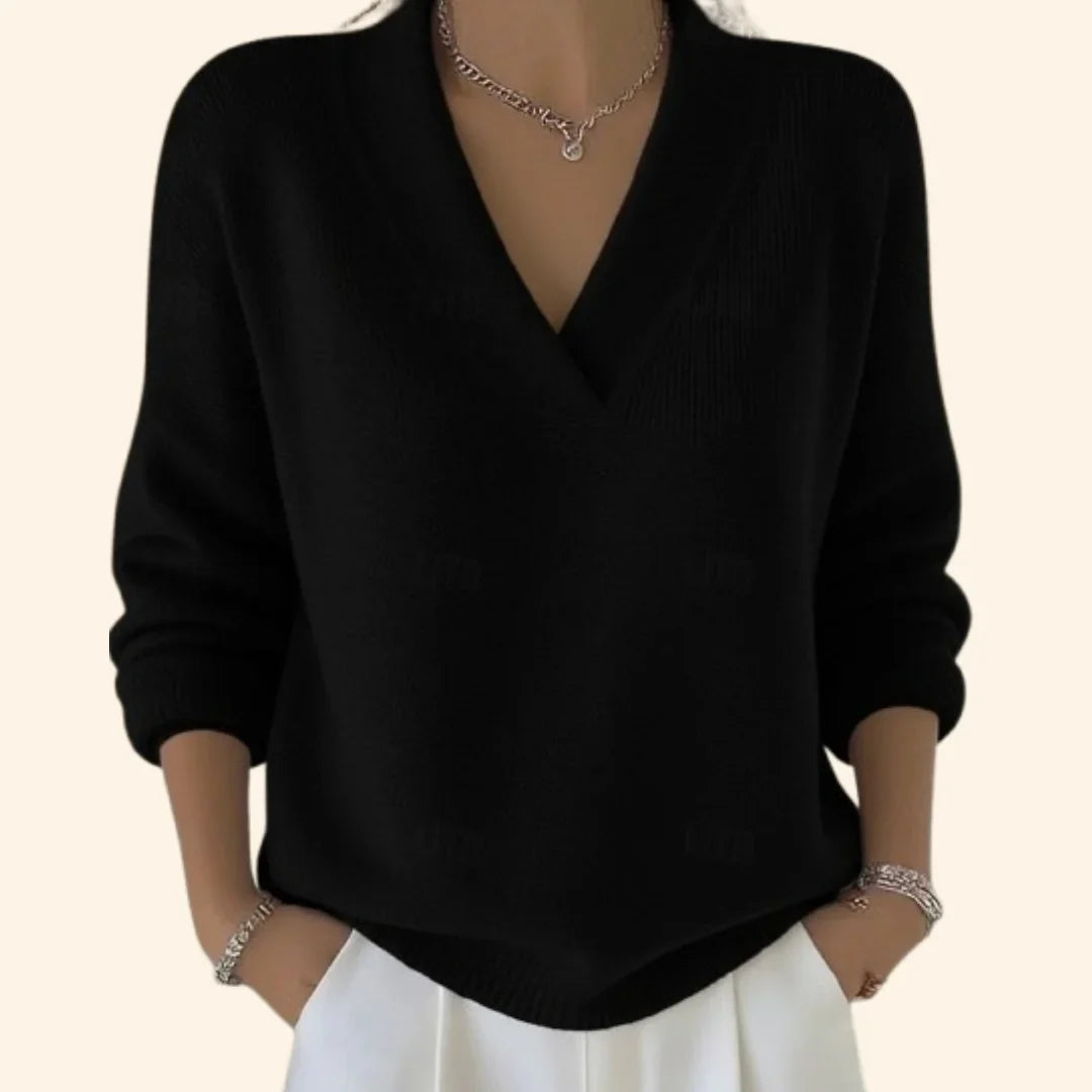 Stylish women's knit V-neck blouse with long sleeves and a relaxed fit, offering ultimate comfort and versatility.