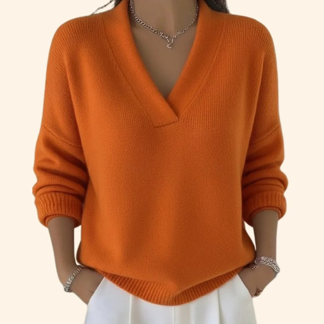 Soft women's knit V-neck blouse, long sleeve and relaxed, an elegant yet casual top for everyday fashion.