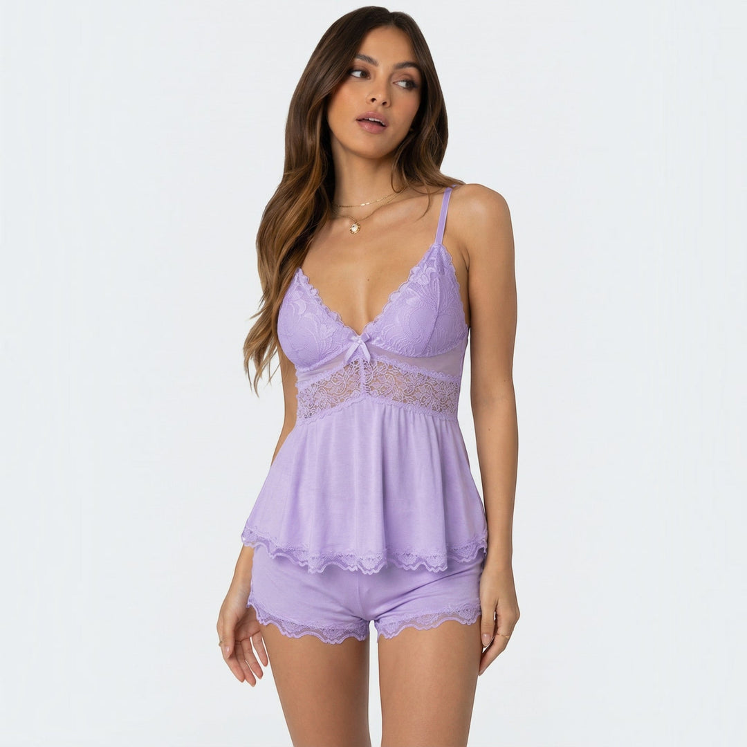 A two-piece women's soft nightwear set featuring a lace trim camisole and comfortable shorts.