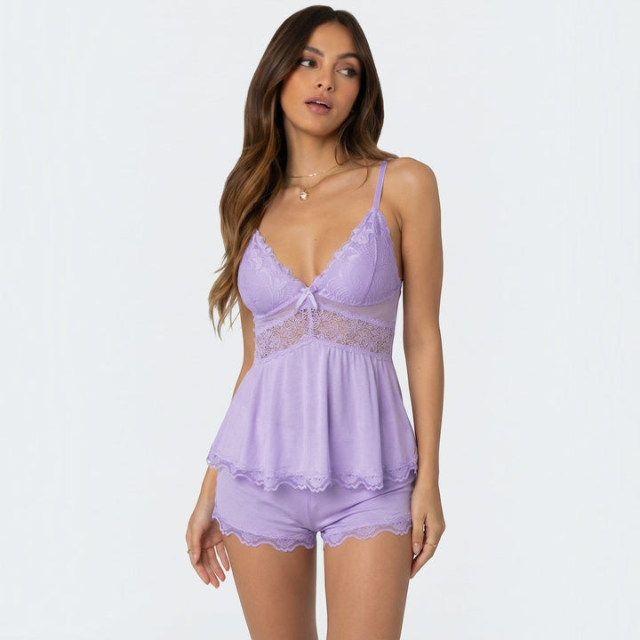 A two-piece women's soft nightwear set featuring a lace trim camisole and comfortable shorts.