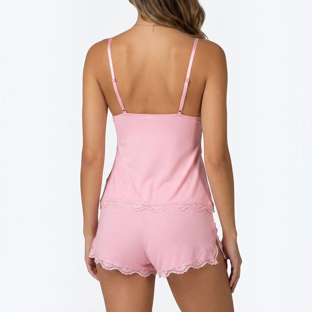 Comfortable women's soft sleepwear set featuring a lace cami and relaxed fit shorts for lounging.