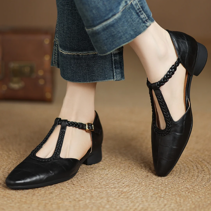 Classic women's soft leather Mary Janes, vintage style & low heel for comfortable all-day wear.