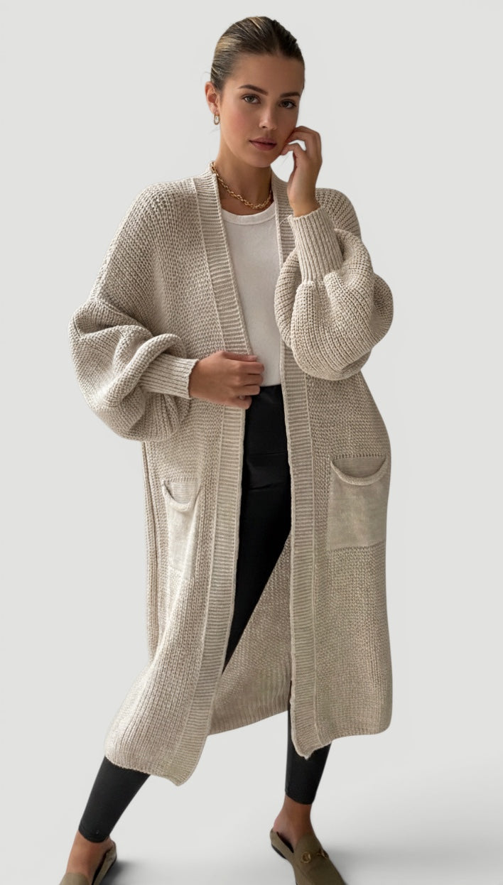 Casual chic women's sand bell sleeve longline cardigan. Soft elegant sweater for comfortable fall layering.