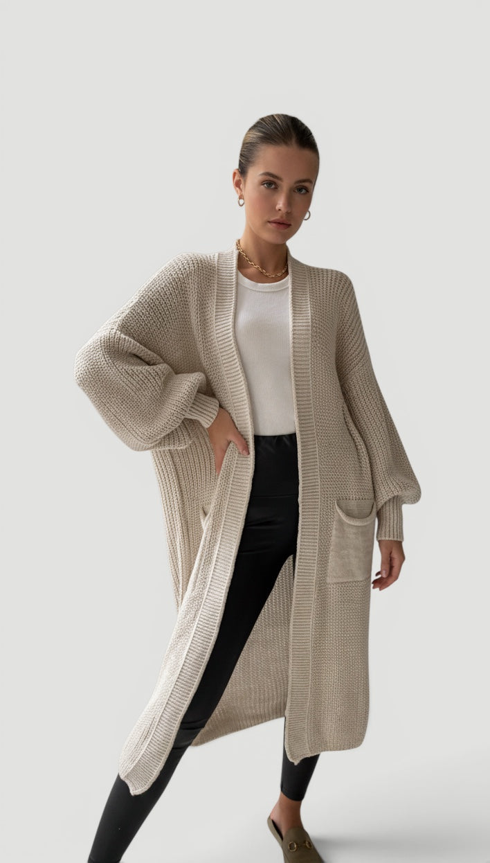Flattering sand longline women's cardigan with soft bell sleeves, ideal for elegant fall layering & comfort.