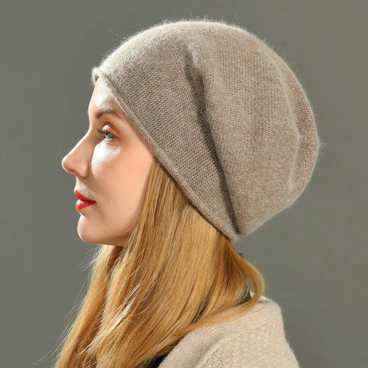 Women's soft slouchy beanie hat in a cozy knit for casual everyday wear. Perfect for fall & winter fashion.