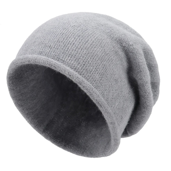 Essential women's soft slouchy beanie for fall and winter fashion. Stay cozy & stylish in this hat.