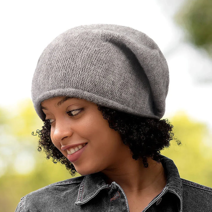 Soft knit women's slouchy beanie, ideal for fall & winter warmth. A stylish and comfortable hat.
