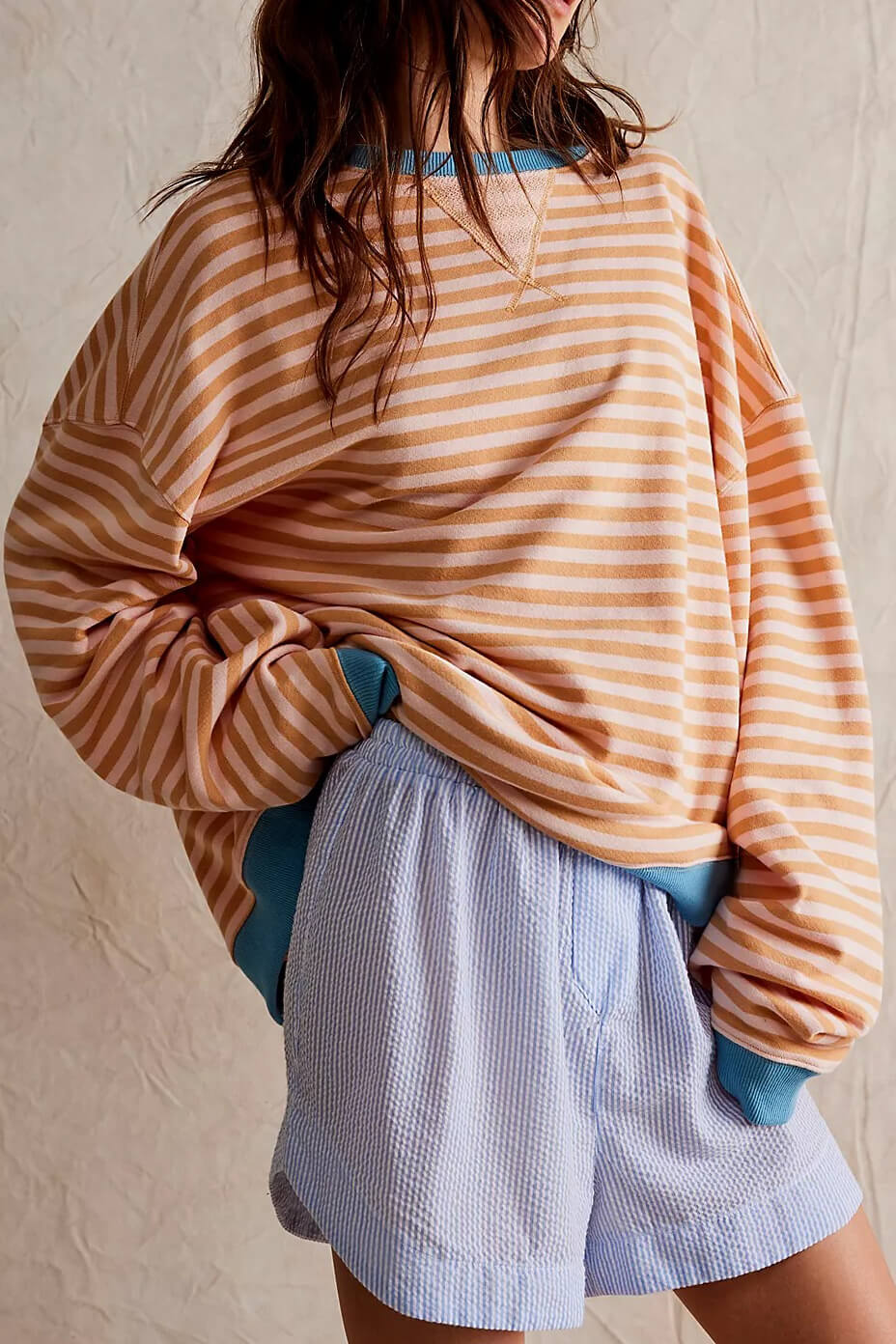 Women's soft striped crewneck sweater, perfect for versatile everyday casual wear.