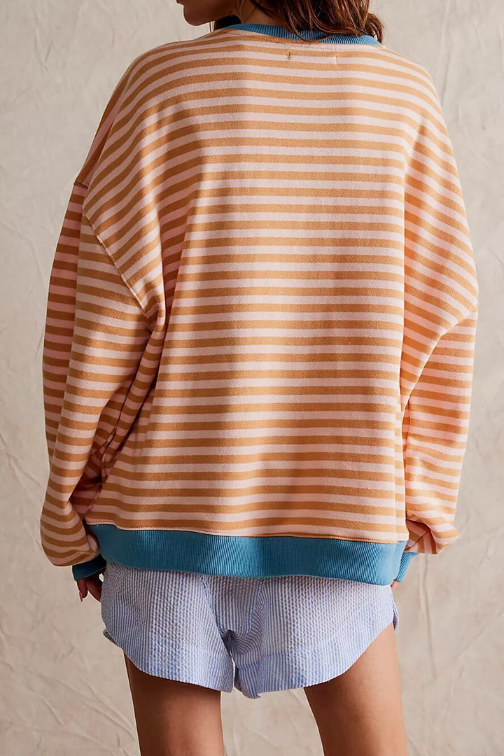 Classic women's pullover sweater with a striped pattern and crewneck design.