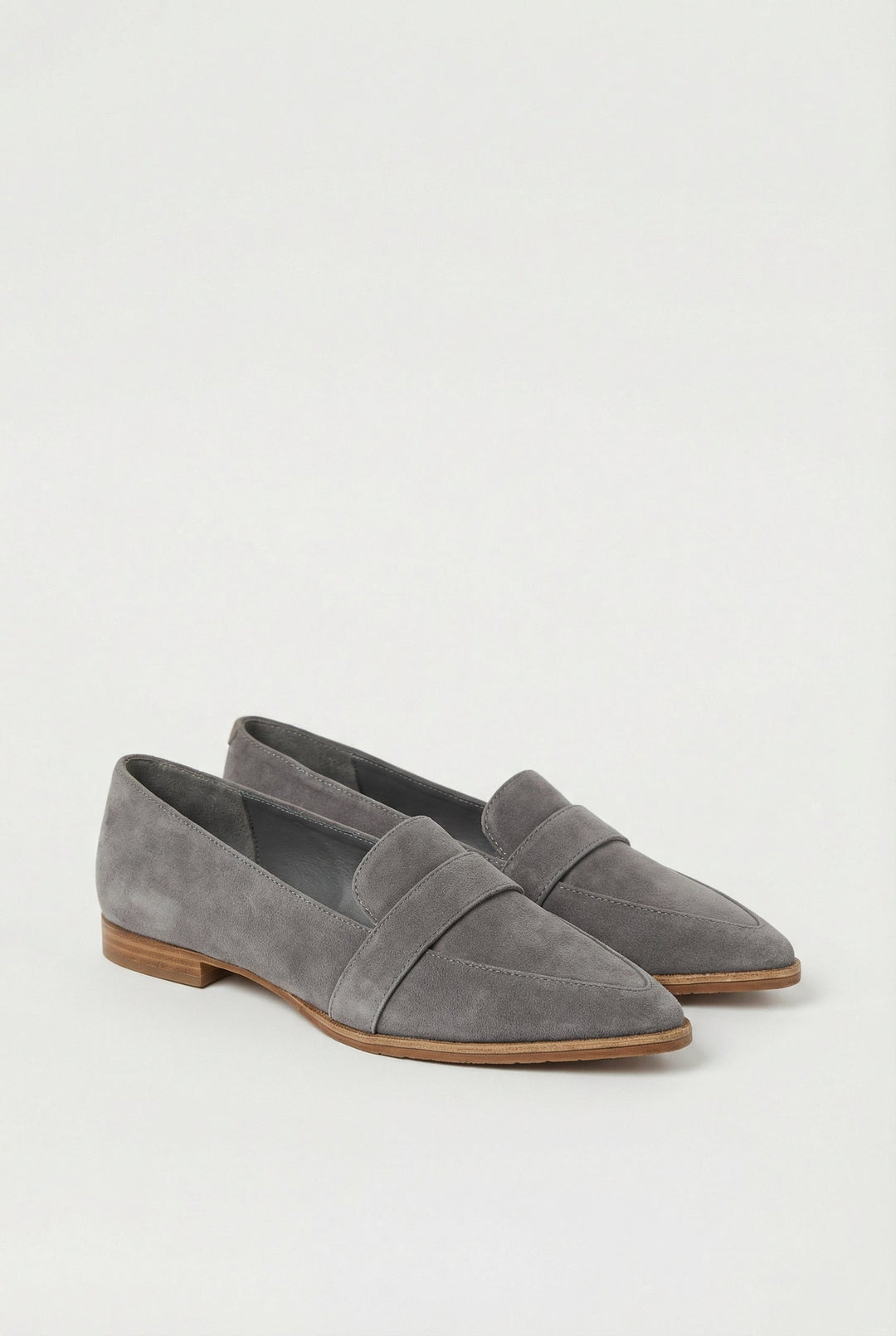 Stylish black suede slip-on shoes for women's comfortable, casual outfits