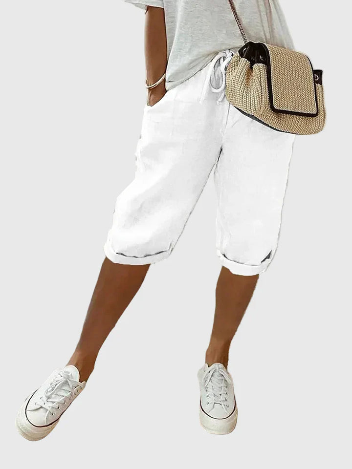 Soft tailored women's comfort shorts in a light color. Perfect for chic everyday casual wear and summer.