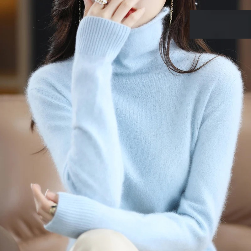 Soft touch women's turtleneck pullover, providing warmth and sophisticated casual style.
