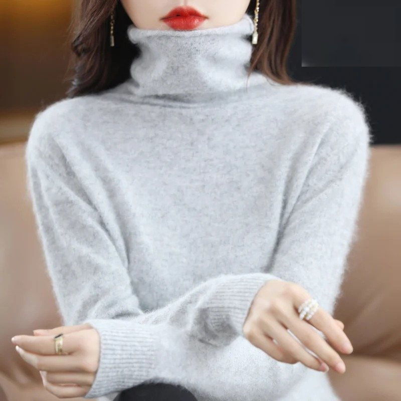 Soft casual women's turtleneck sweater, providing warmth and everyday comfort.
