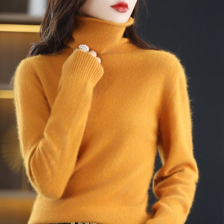 Comfortable women's turtleneck top, an essential soft pullover for everyday winter style.