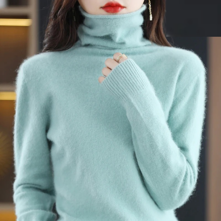 Elegant women's long sleeve turtleneck pullover in a soft, comfortable fabric for casual wear.