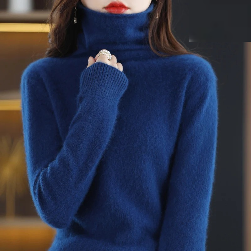Soft long sleeve women's pullover, featuring a cozy turtleneck for ultimate winter comfort.