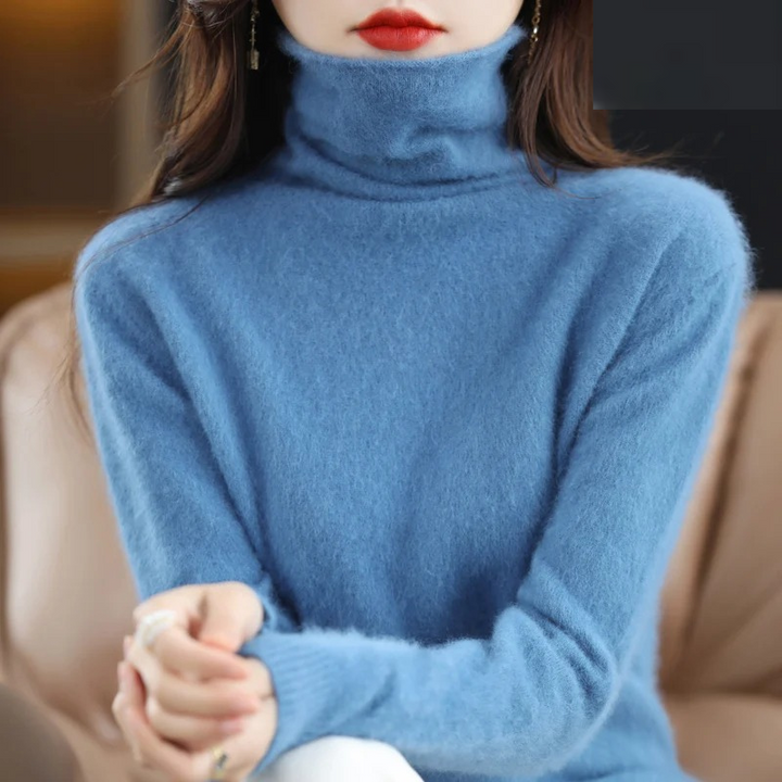 Cozy women's pullover sweater with a soft turtleneck, a must-have for winter style.