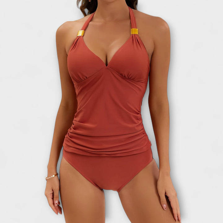 Dive into summer with this women's solid halter two-piece swimsuit, a must-have for beach and pool fun.