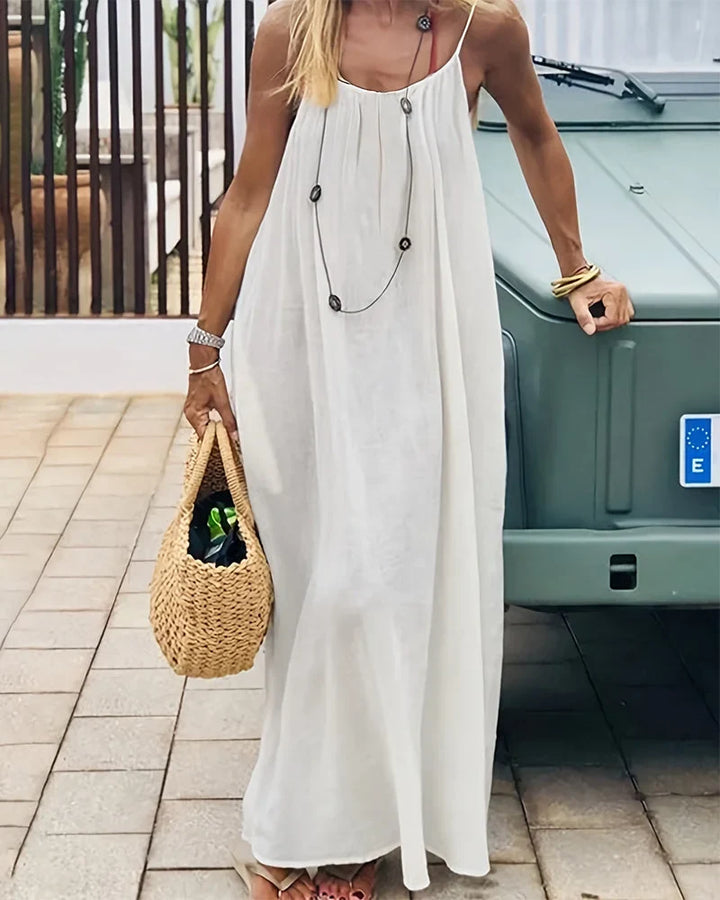 Women's solid sleeveless cami maxi dress, perfect for casual summer wear.