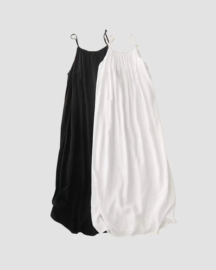 Elegant women's long cami maxi dress, flowy and perfect for summer vacation.
