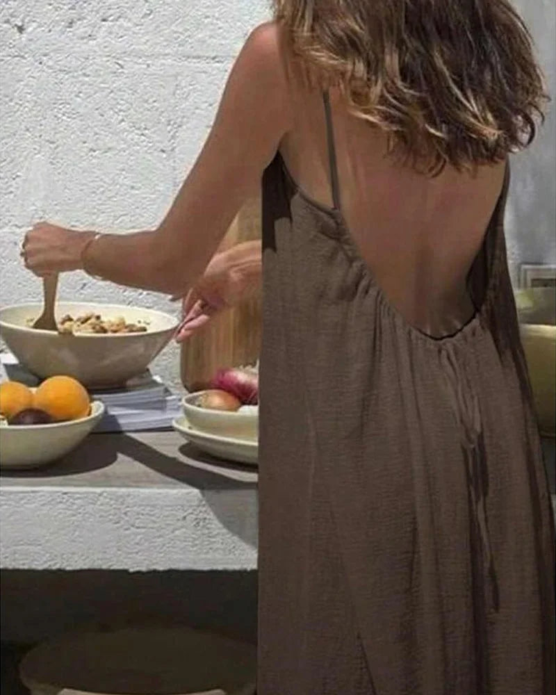 Women's cami strap maxi dress, a comfortable and flowy solid option for warm weather.
