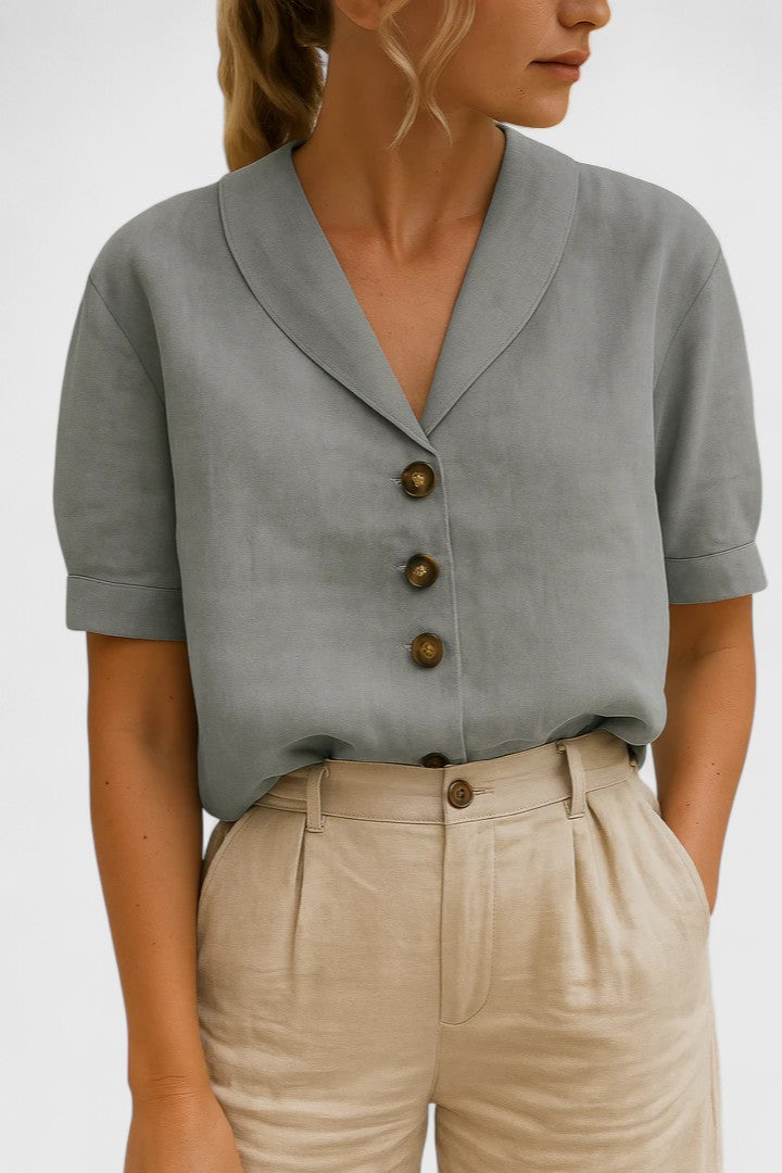 Chic women's blouse, a sophisticated loose fit top perfect for casual elegant ladies fashion. Ideal for spring outfits.
