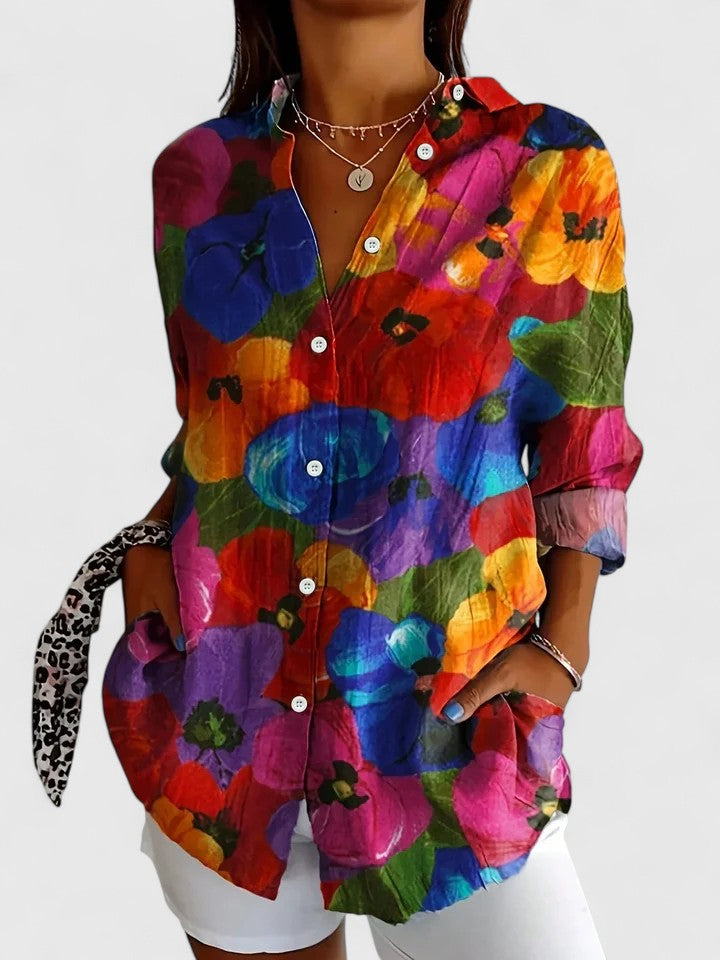 Sophisticated women's blouse with a vibrant, eye-catching print, suitable for versatile fashion, casual wear, and elegance.