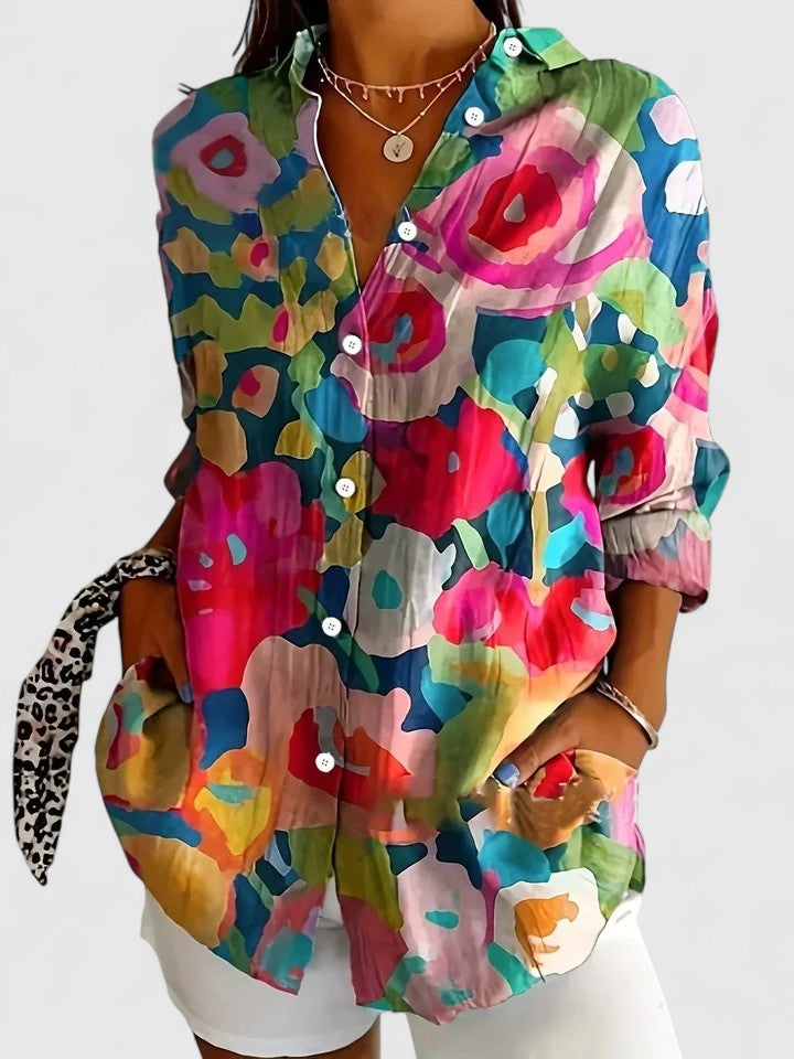 Women's comfortable long sleeve blouse with a bold vibrant print, an elegant shirt for sophisticated and casual outings.