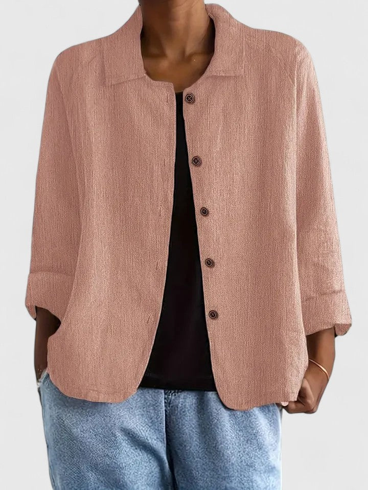 Women's sophisticated long sleeve top in a chic, comfortable loose fit, perfect for everyday wear.