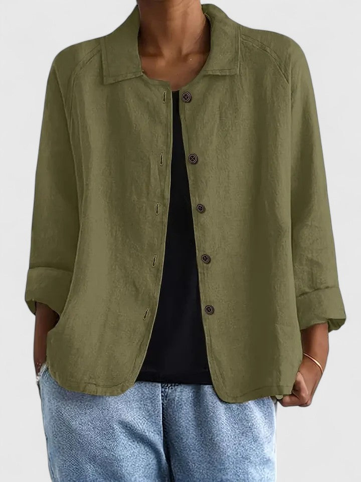 Stylish women's long sleeve top, offering chic comfort and a loose fit for everyday sophistication.