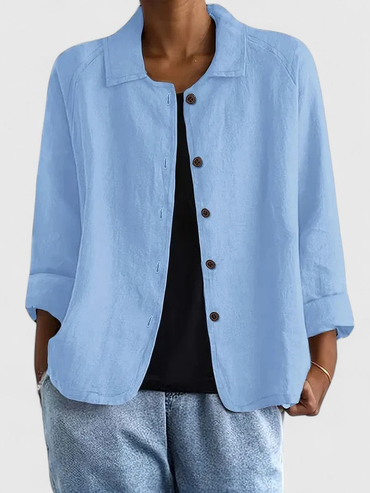 Transitional women's top, a chic comfort blouse with a loose fit, perfect for layering and everyday wear.