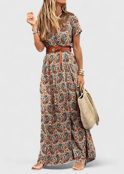 Sophisticated green women's maxi dress with a flowing silhouette, perfect for summer elegance or casual wear.