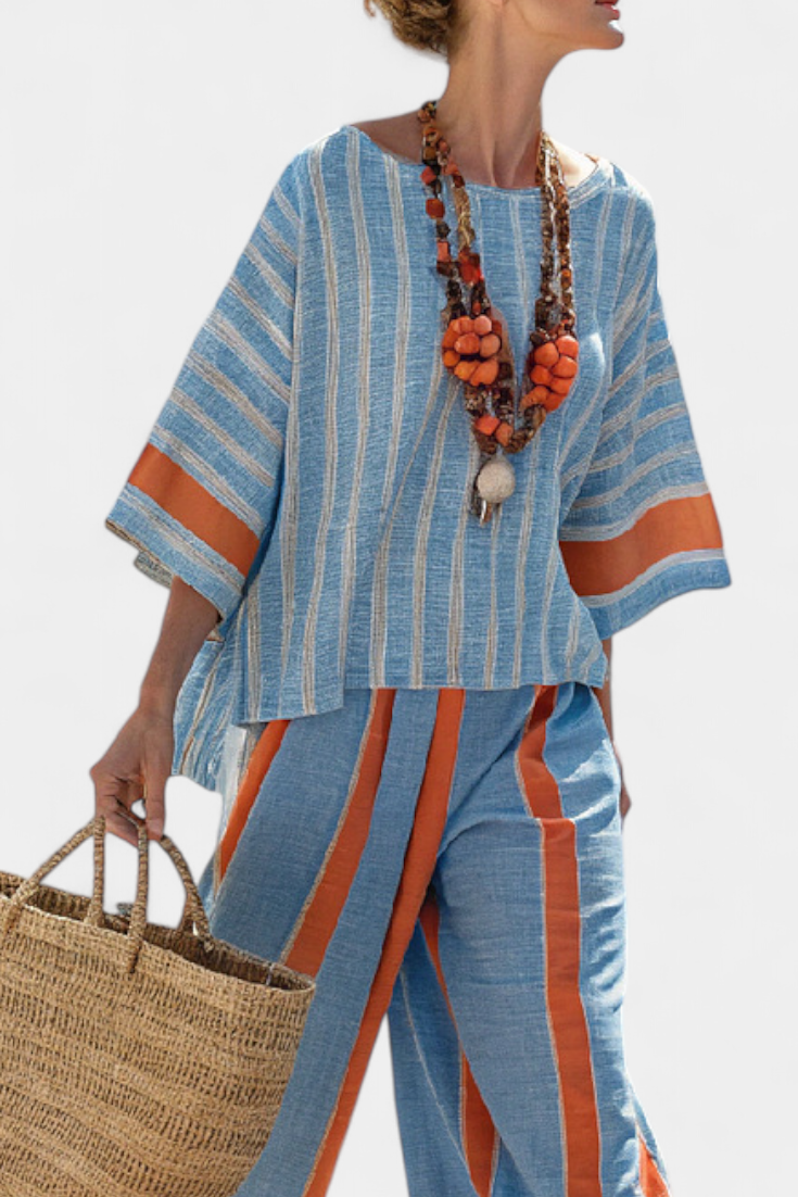 Relaxed fit terracotta striped co-ord set for women. Ideal vacation, beach, or travel fashion. Two-piece outfit.