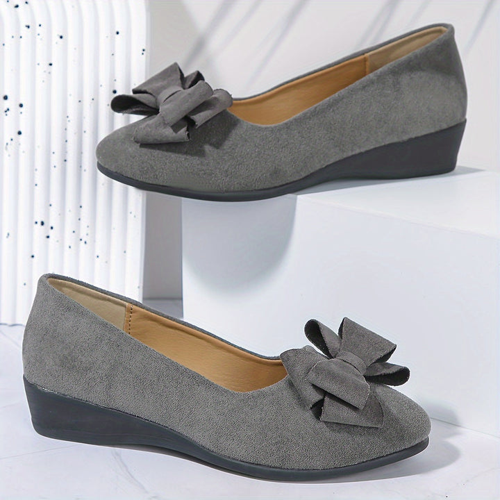 Sophisticated women's dress shoes, blending elegant comfort with superior foot support for walking.