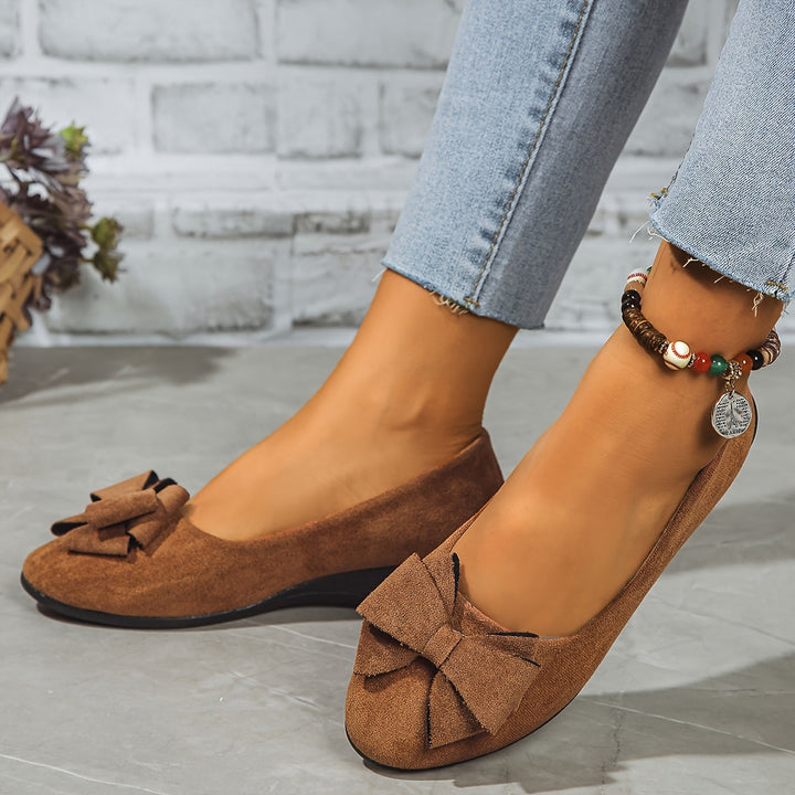 Sophisticated women's footwear, blending chic design with foot support for elegant walking comfort.