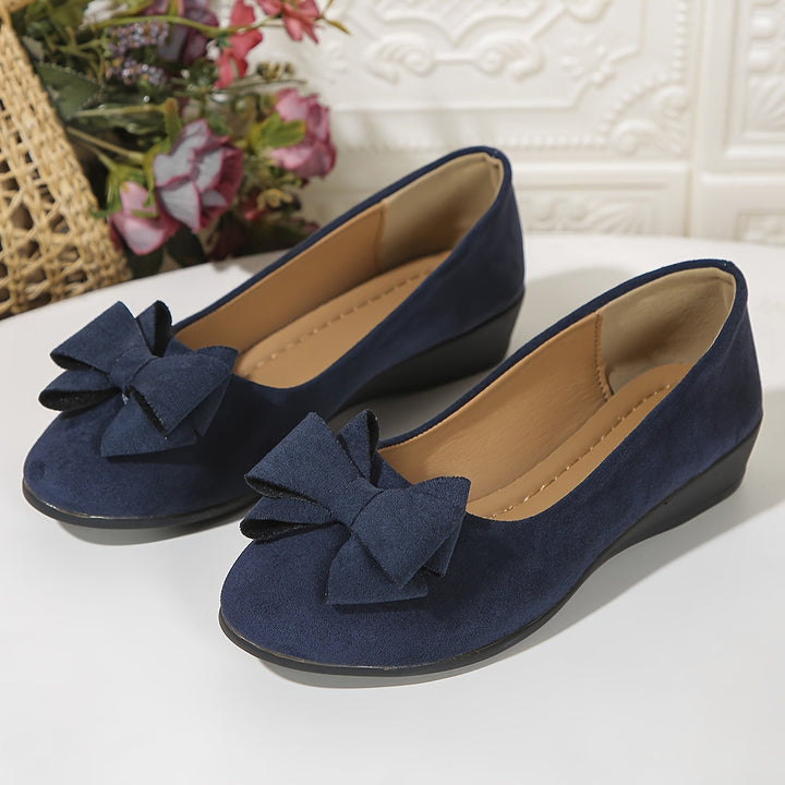 Women's comfortable walking flats, providing sophisticated style & excellent foot support.