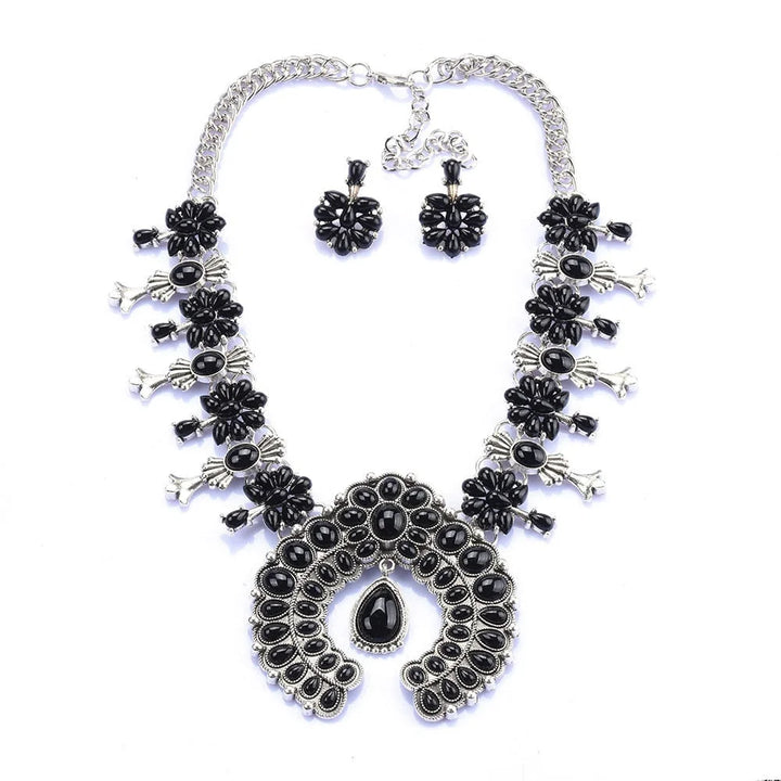 Striking women's turquoise floral pendant necklace & coordinating earrings. Southwest bohemian jewelry set.
