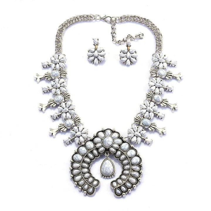 Elegant women's Southwest turquoise floral necklace & earrings set. Intricate design, perfect bohemian jewelry.