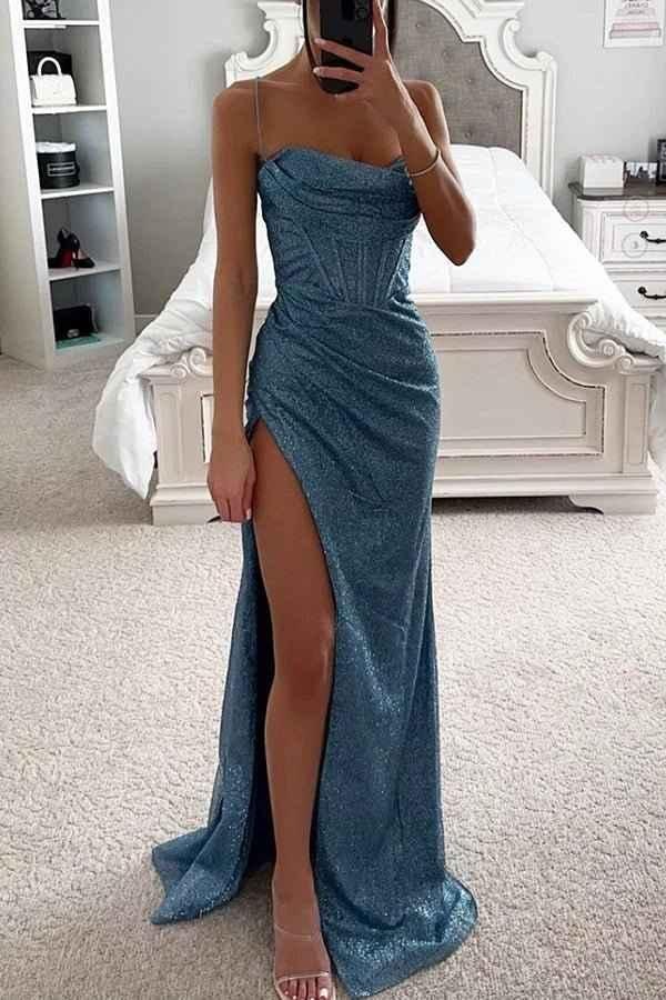 Sophisticated corset evening dress featuring delicate spaghetti straps, alluring high leg slit, and a formal design.