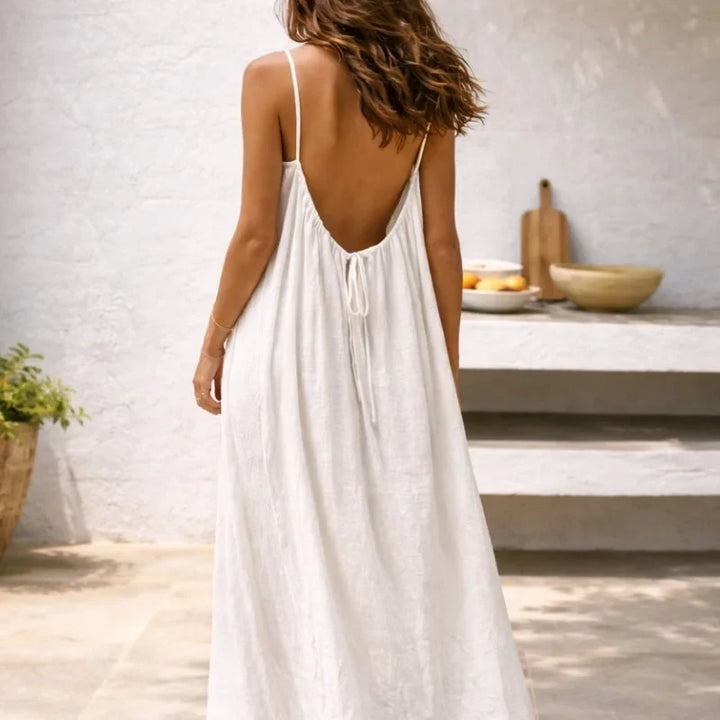 Stylish women's summer dress: spaghetti strap maxi with convenient pockets, suitable for casual & beach.