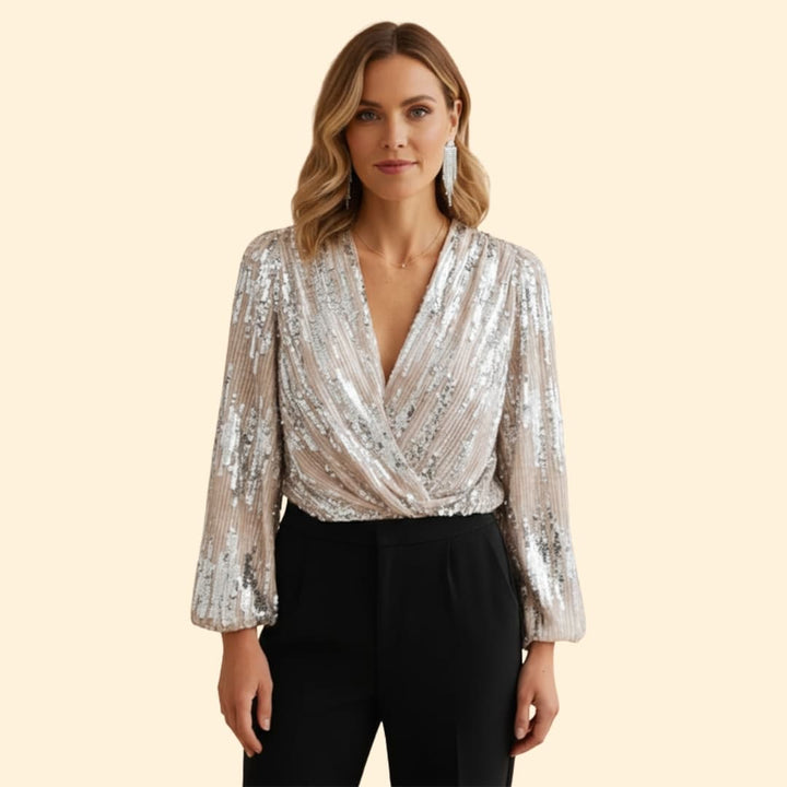 Elegant long sleeve women's sequin wrap top, gold sparkle, V-neck design for a chic party or evening look.