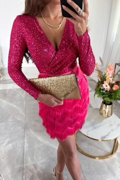 Women's celebration dress: dazzling sequins and eye-catching fringe.