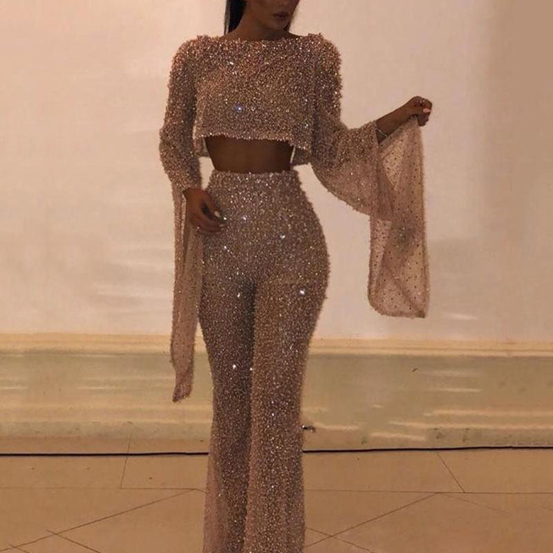 Women's sparkling wide leg two-piece set with long sleeve chic top.