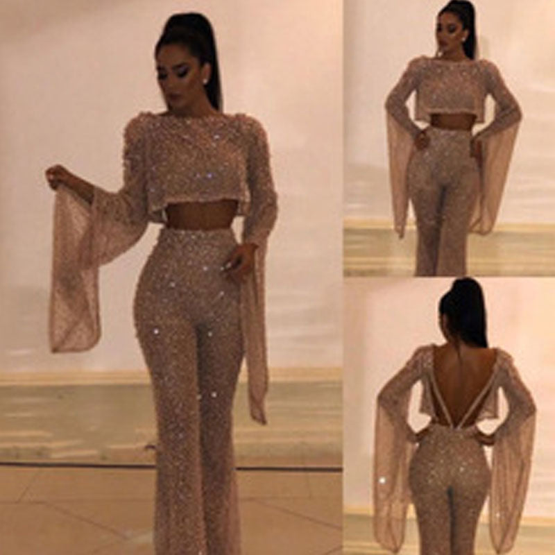 Chic two-piece outfit featuring sparkling wide leg pants and long sleeve top.