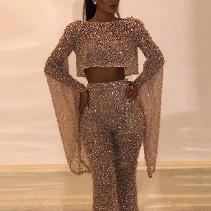 Party wear: dazzling two-piece set with glittery wide leg trousers and top.