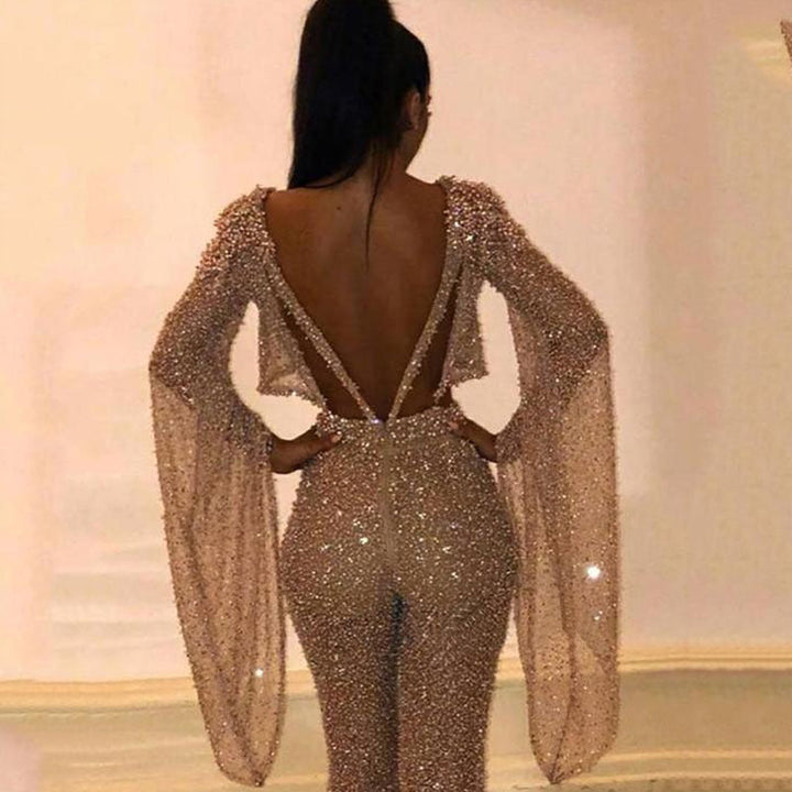 Full view of women's sparkling wide leg two-piece set, long sleeve fashion.
