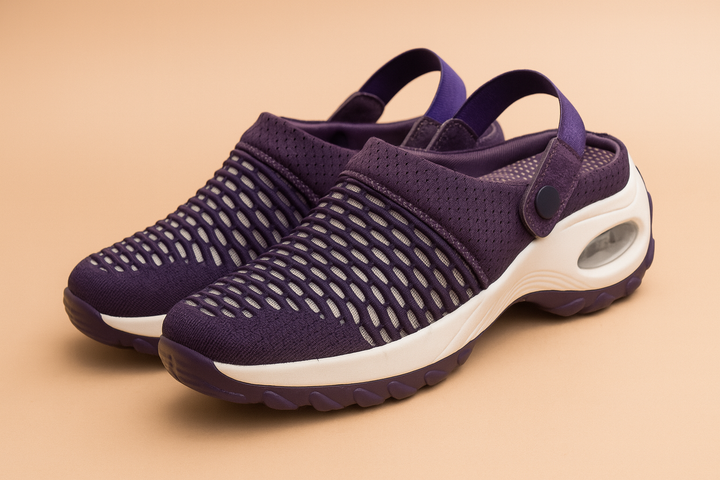 Side view of ventilated women's clogs, perfect for casual everyday wear