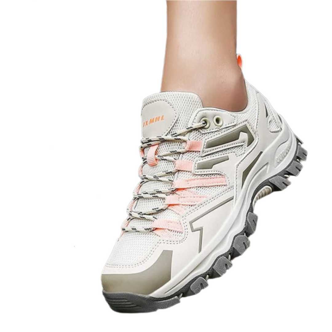 Women's sporty walking shoes in pink, offering superior comfort & grip for active outdoor adventures.