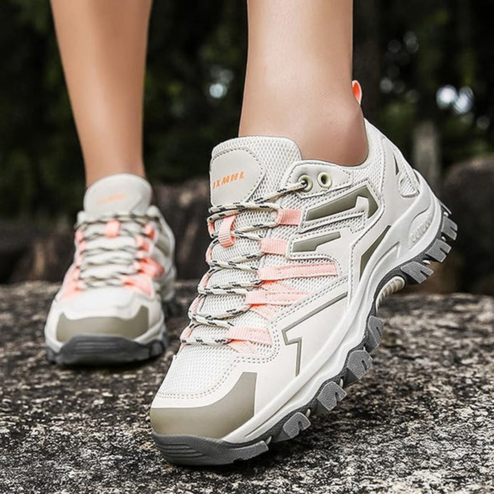 Pink & purple women's sporty walking shoes, combining comfort, style, and reliable grip for all activities.