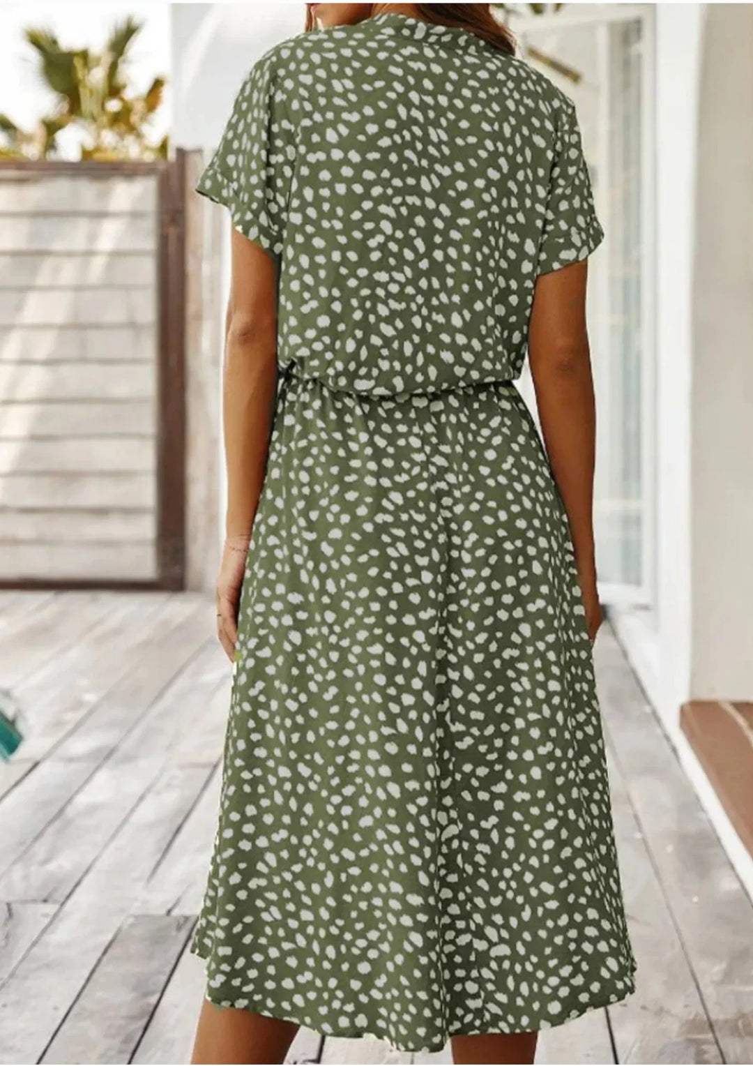 Women's spotted print midi dress, elegant day wear. Button-down front, comfortable drawstring waist.